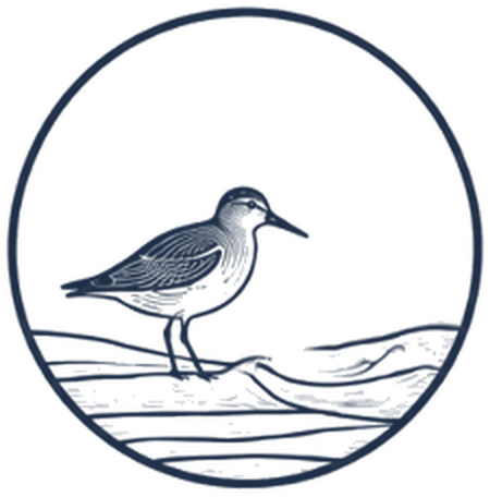 Monterey Press logo: a sandpiper at the water's edge